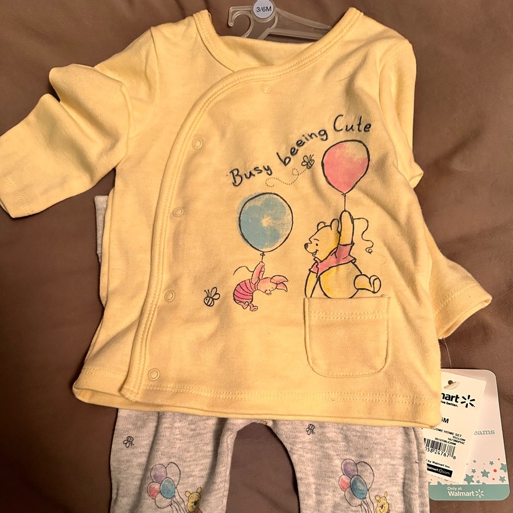 Brand new Winnie the Pooh outfit.